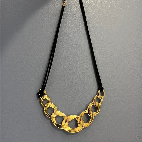 Jewelry - Gold tone metal and black cord Statement Necklace